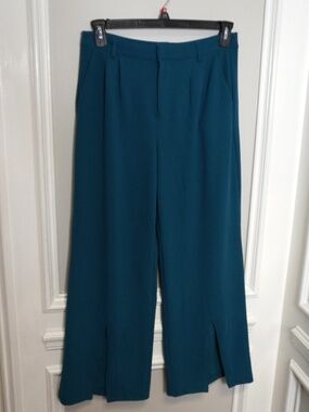 Happily Grey High-waisted wide-leg trousers with front slits at the bottom.